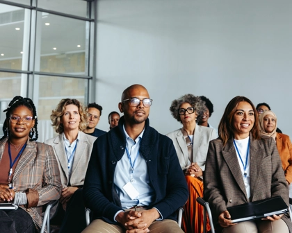 diverse mix of adults office setting 30-40yrs