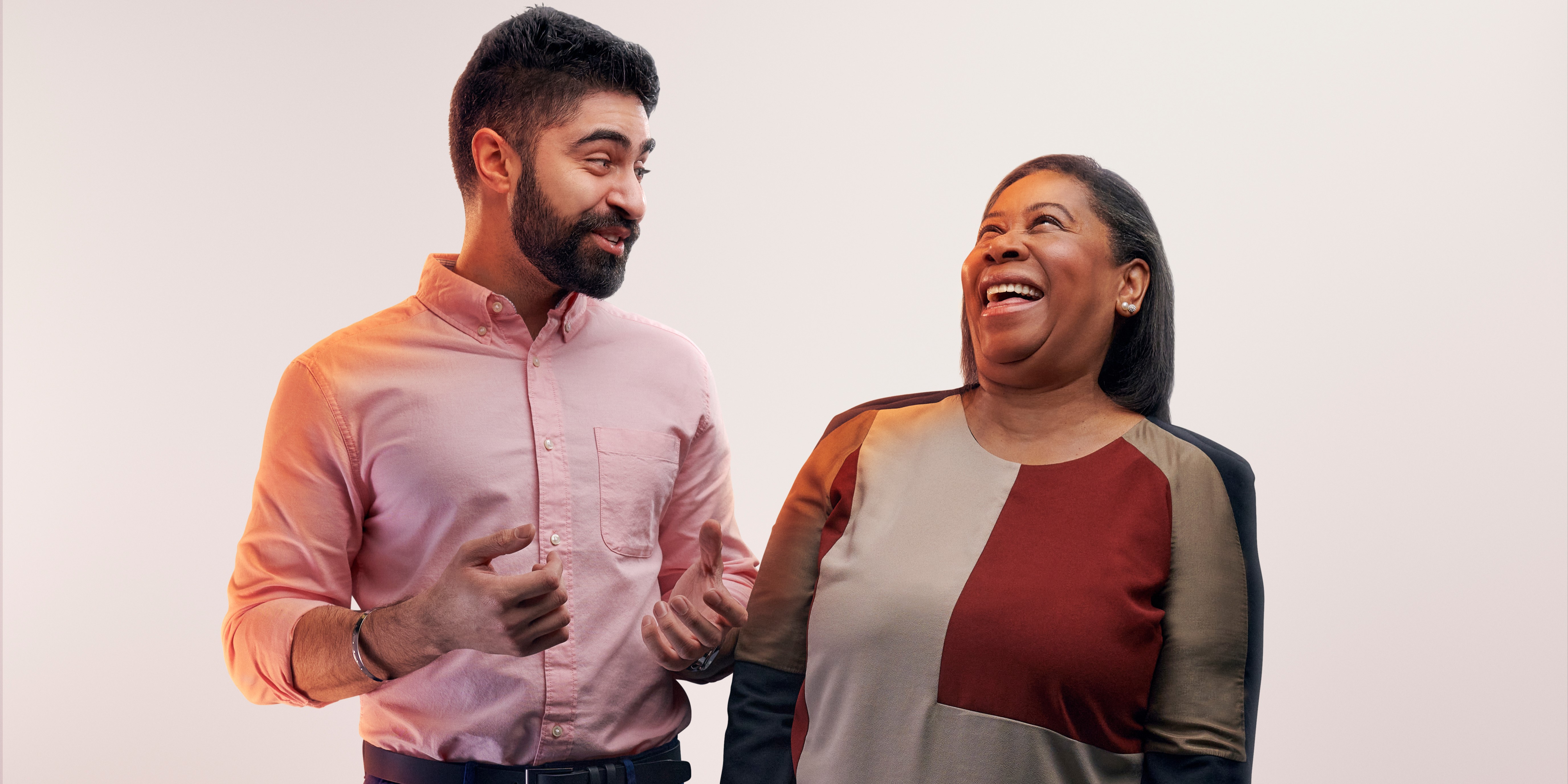 man and woman laughing