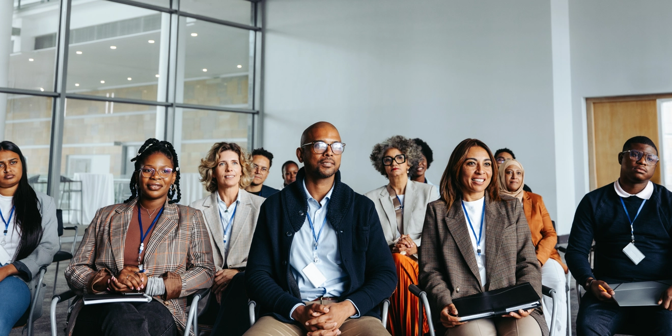 diverse mix of adults office setting 30-40yrs